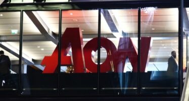 DoJ Sues to Halt Merger Deal Between Insurer Aon and Willis